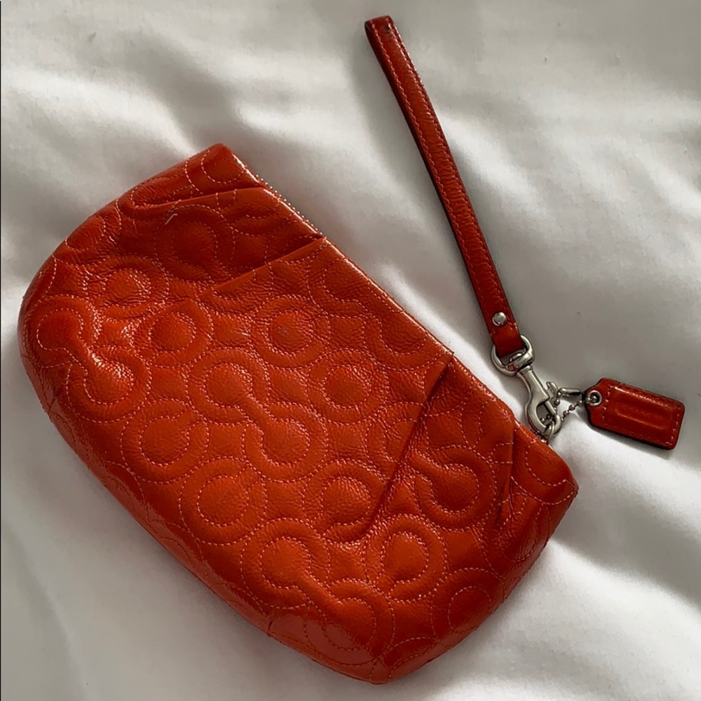 Coach Embossed Orange Leather Wristlet